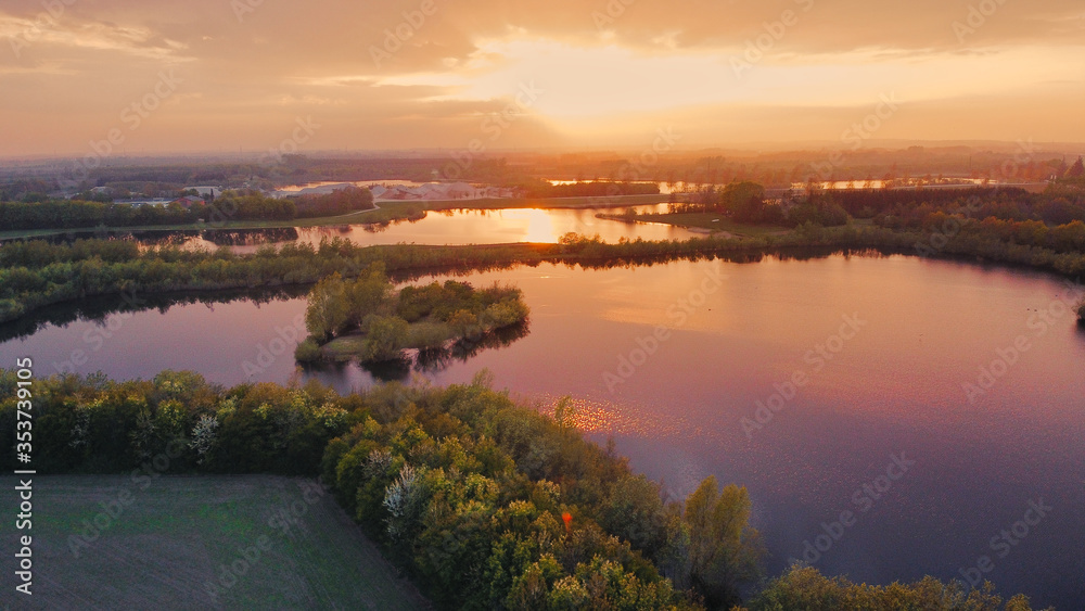 Obraz premium Sunset above some lakes in south jutland