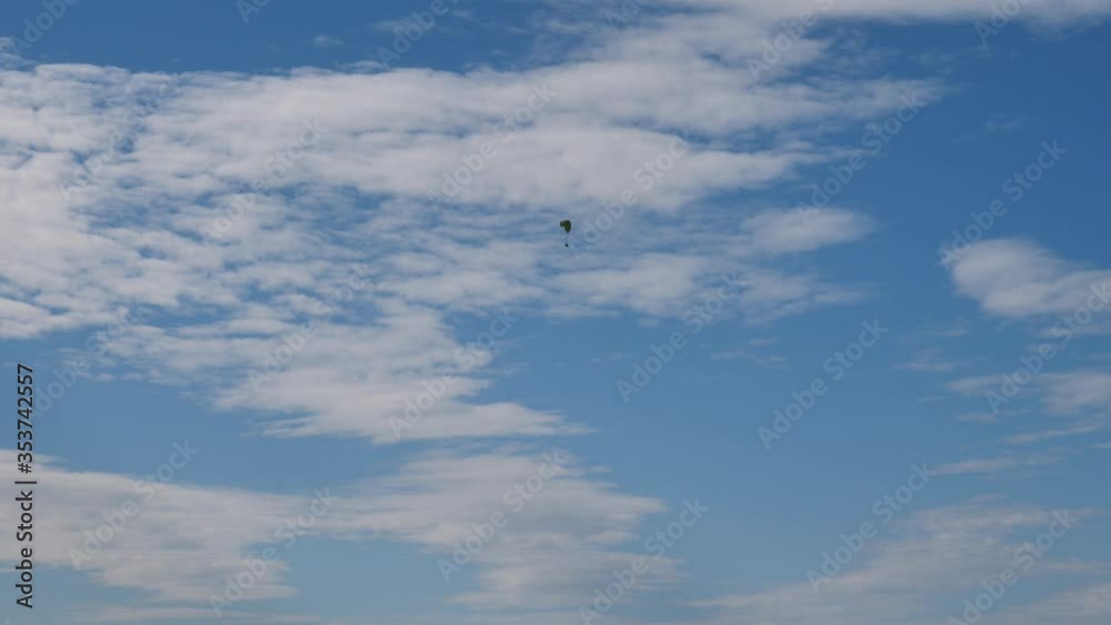 paragliders in blue sky with white clouds enjoying the sports of freedom para gliders paragliders in blue sky with white clouds enjoying the sports of freedom para gliders