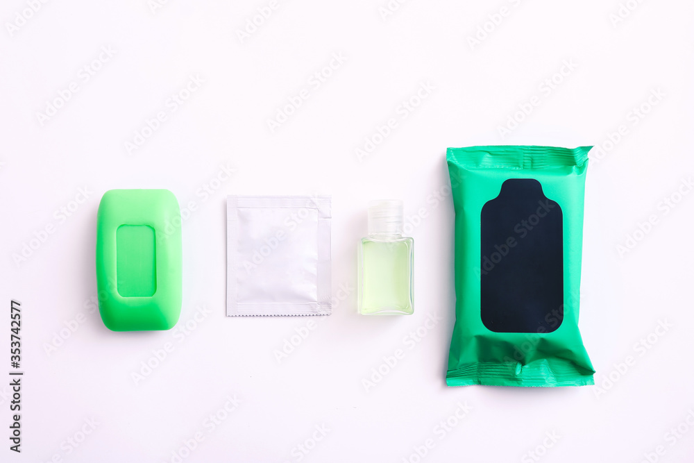 Set of personal protective equipment against viruses on white background, top view. Antibacterial gel, soap and wipes for hygiene Set of personal protective equipment against viruses on white background, top view. Antibacterial gel, soap and wipes for hygiene