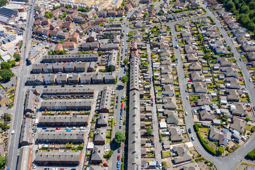 Aerial photo of the village of Cleckheaton in Yorkshire in the UK showing a top down view of a typical British housing estate, taken in a sunny summers day