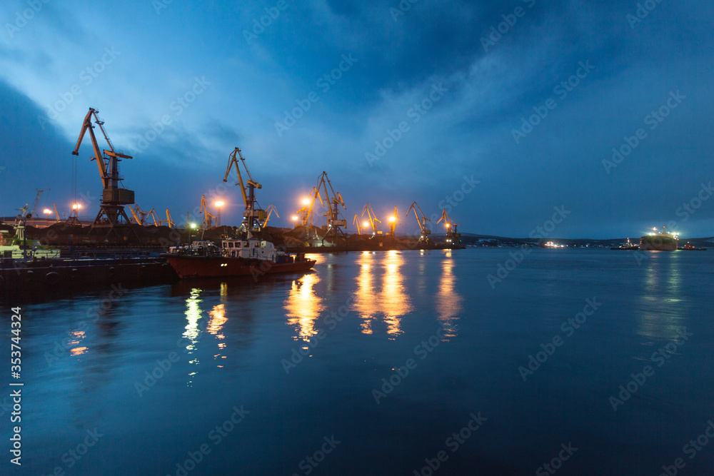 General day view of the cargo port. Cargo port cranes await the arrival of the vessel for loading.