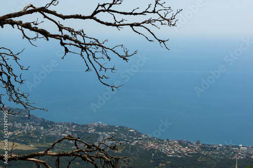 Obraz na płótnie View of the sea and city blocks off the coast from Mount Ai-Petri, Yalta. w salonie