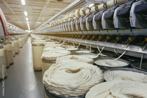 Rolls of industrial cotton fabric for clothing cloth textile manufacture on machine © Sergejus Michalenko