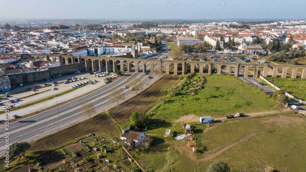 Aerial view of the Água de Prata aqueduct in Évora, Portugal. Monumental aqueduct in the city of Évora