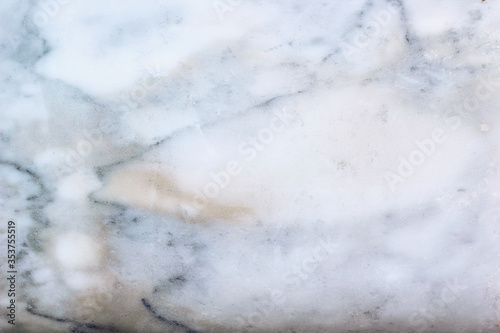 The marble surface shows natural patterns. © Siriporn