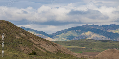 mountain landscape with blue sky and clouds