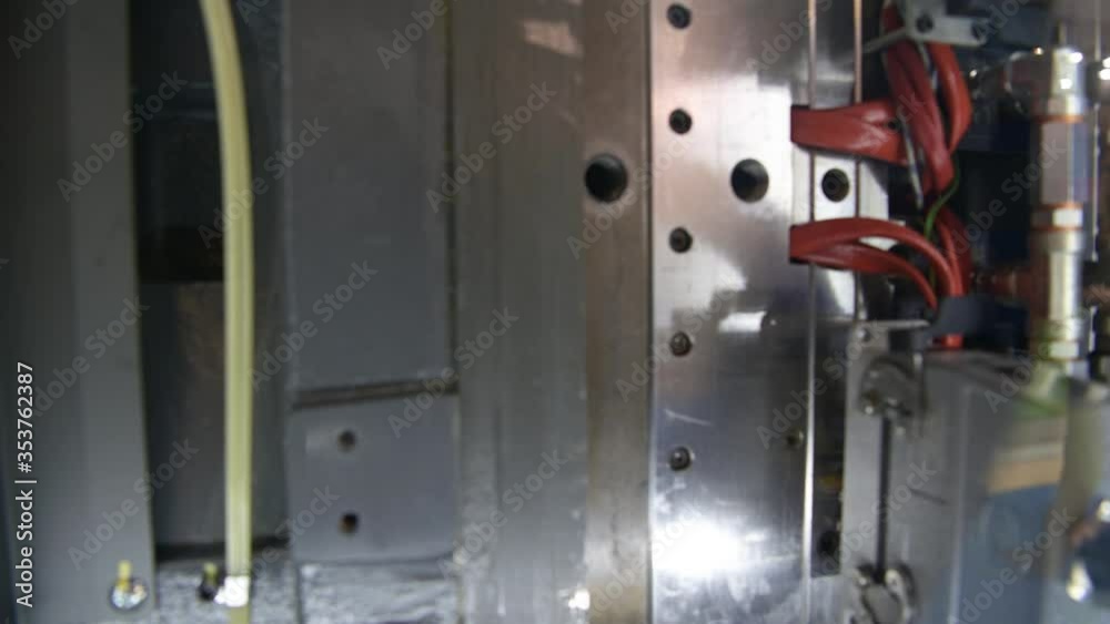 Automatic press for the production of plastic products. Automatic press for the production of plastic products.