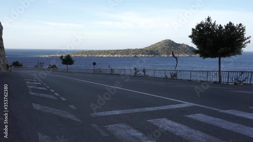 ANTALYA, TURKEY, MAY 22, 2020: Coronavirus days in Kaputas Beach. Empty roads of Kas in a windy morning.