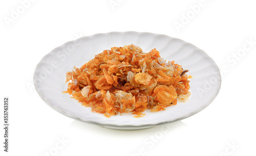 Fried garlic isolated in white plate on a white background
