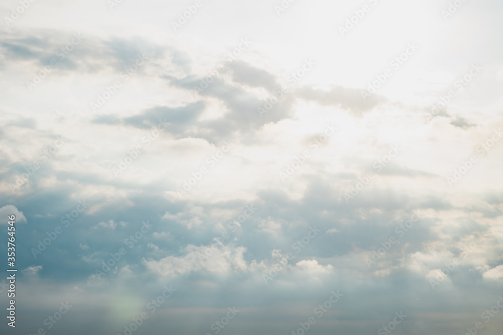 Sunset sunrise and beautiful twilight fluffy storm cloudy blue and yellow sky smoothly flowing to fantastic mind. Rainy good evening and have a nice day concept. Sunset sunrise and beautiful twilight fluffy storm cloudy blue and yellow sky smoothly flowing to fantastic mind. Rainy good evening and have a nice day concept.