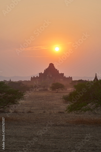 Landscape with an ancient temple at sunset in old Bagan, Myanmar, Burma.
