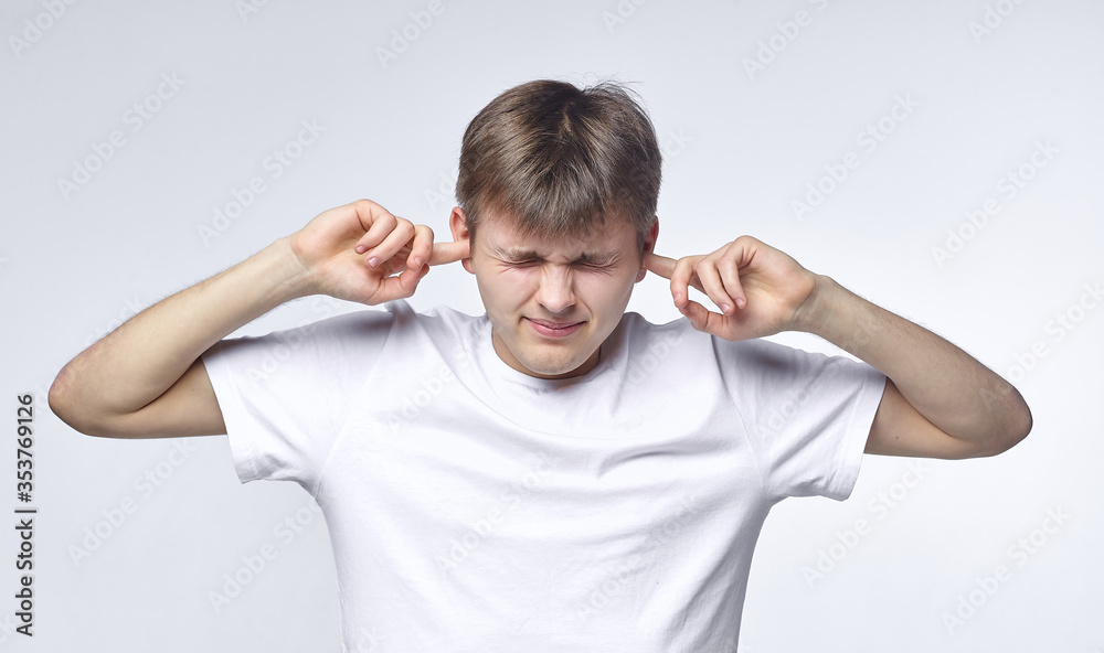 The young guy shows various emotions. Talented portrays the inner state and mood. Advertisement concept The young guy shows various emotions. Talented portrays the inner state and mood. Advertisement concept
