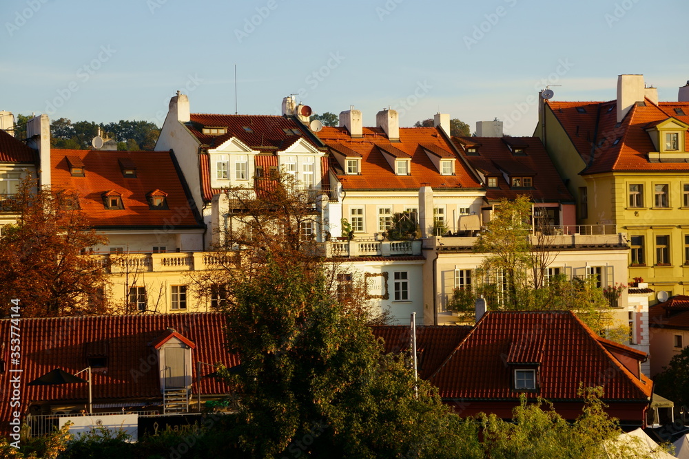 Early morning sunlight on the buildings of Prague taken off the Charles Bridge