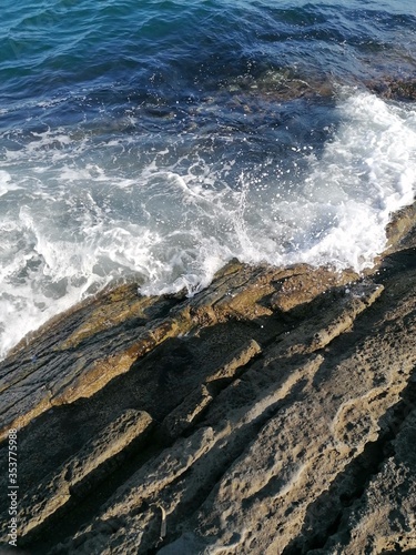 waves crashing on rocks