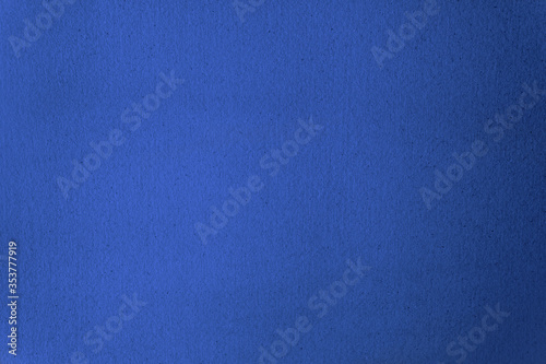 Blank navy blue colour on recycled organic paper for the environment to be use as a background.