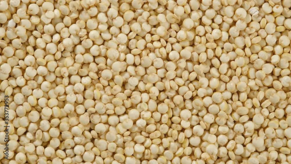 superfood quinoa seeds rotating top view. Amazing macro background with vibrant texture superfood quinoa seeds rotating top view. Amazing macro background with vibrant texture