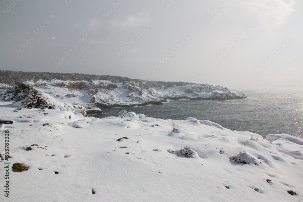 Ionian coast after a exceptional snowfall, Salento, Italy