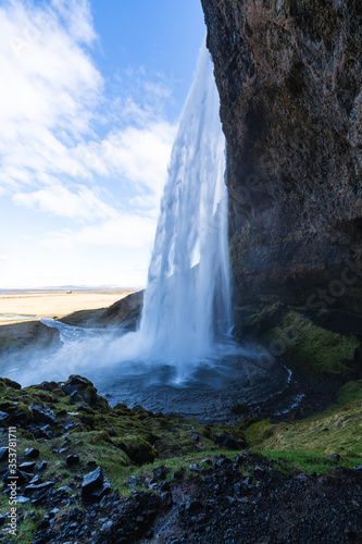 One of the most famous waterfalls in Iceland called Seljalandsfoss is located in the Golden Circle and is easy accessible from the Ring Road