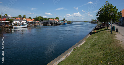 enø canal with blue sky and clouds 
