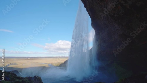 A high resolution slow motion footage of famous waterfall Seljalandsfoss located in the Golden Circle of Iceland easily accessible from the Ring Road