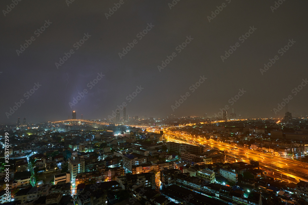 Fototapeta premium Lightning strike in the City at Night Time&nbsp;Thailand