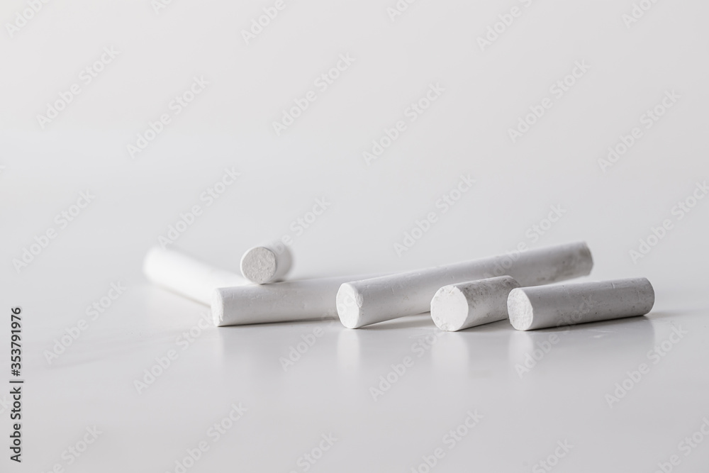 close up of chalks on gray  background.