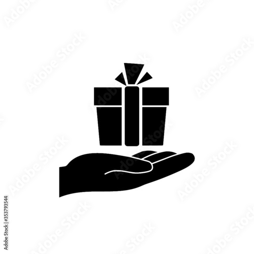 A silhouette icon from the hand that gives a donation.  Gift box icon isolated on white background