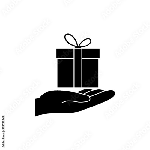 A silhouette icon from the hand that gives a donation.  Gift box icon isolated on white background