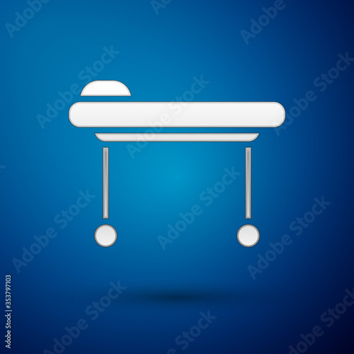 Silver Stretcher icon isolated on blue background. Patient hospital medical stretcher. Vector Illustration.