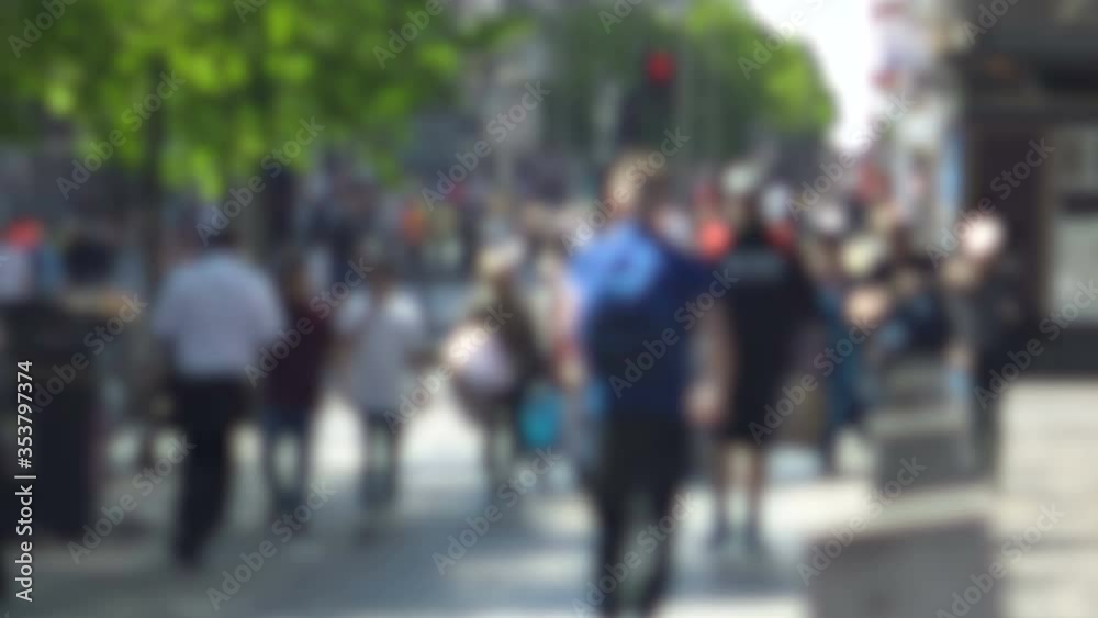 Blurred Anonymous Crowd of People Walking in City Blurred Anonymous Crowd of People Walking in City