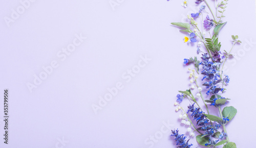 Fototapeta Naklejka Na Ścianę i Meble -  beautiful summer flowers on blue background