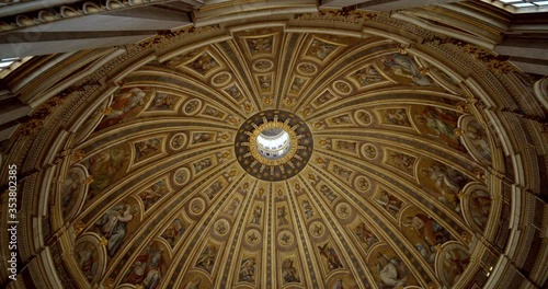 Detail of dome Renaissance ceiling as seen within St. Peter's Basilica in Rome Italy photo