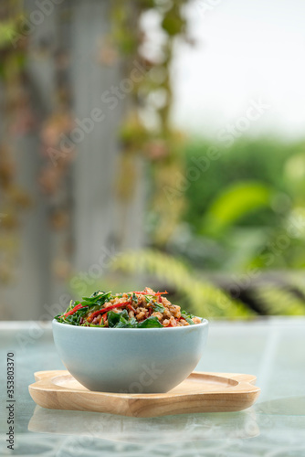 Stir fried minced pork with basil leaves on  thai jasmin rice , thai street food