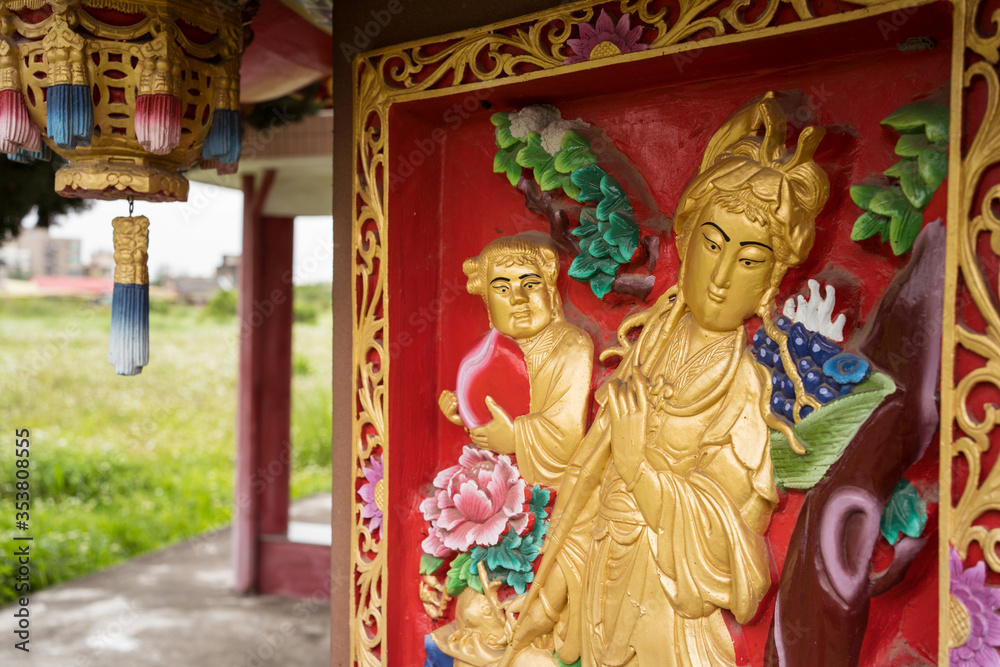 Detail images of colorful Taoist temple with dragons and gods to protect farmers and farms in rural part of Hsinchu Detail images of colorful Taoist temple with dragons and gods to protect farmers and farms in rural part of Hsinchu