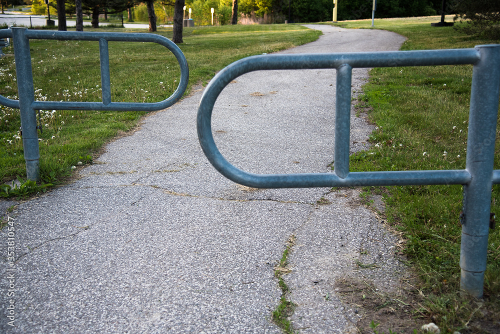 fence in a pedestrian trail