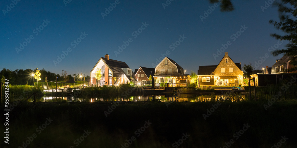 Obraz premium Night image of housing estate 