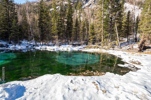 Blue geyser lake in Altay mountains