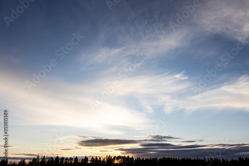 Cumulus clouds against a blue sky. Background and Wallpaper for desktop © Kateryna