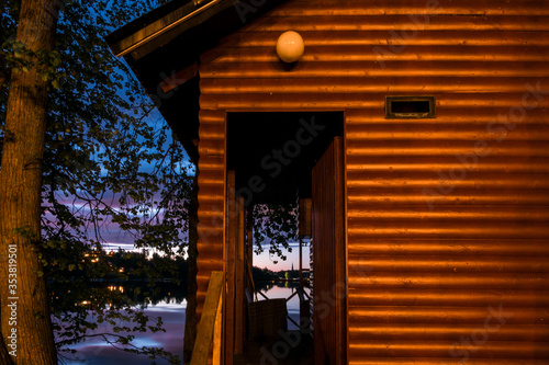 Stockholm, Sweden  The facade o f a small house at night on Idskar, an island in Lake Malaren.