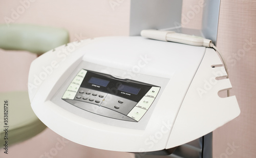 cosmetologist equipment. modern device for skin rejuvenation and ultrasonic face cleaning. Non-surgical face lifting. SMAS lifting Facelift device. Spa treatment. Hardware cosmetology.  photo