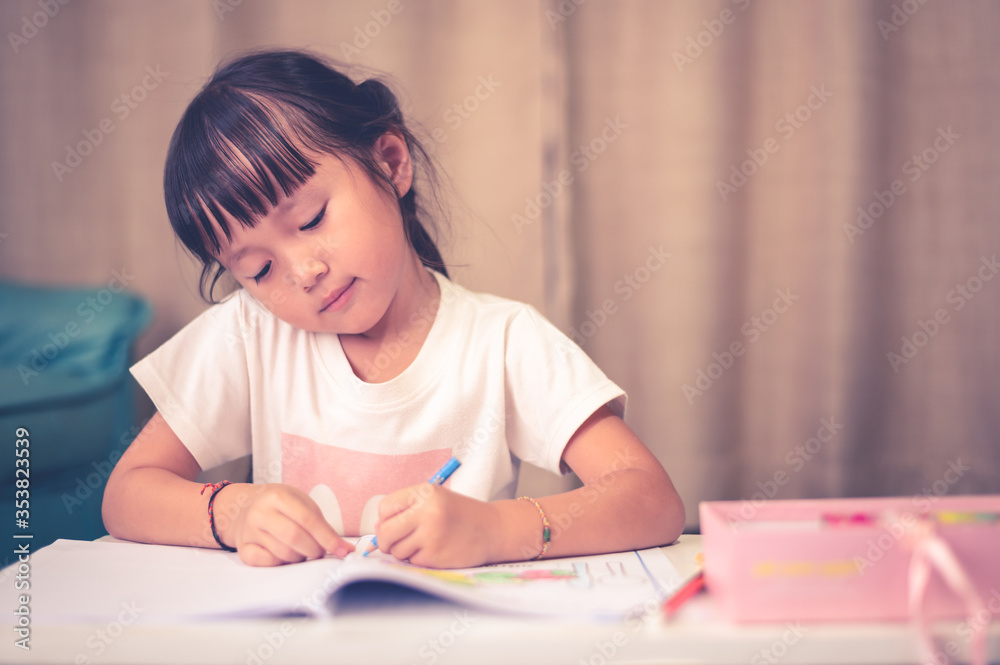 School Home work concept,Asian children doing school home work drawing during the COVID-19 quarantine. Coronavirus isolation. online studying from home School Home work concept,Asian children doing school home work drawing during the COVID-19 quarantine. Coronavirus isolation. online studying from home