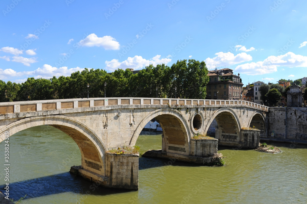 Bridge over the Rome river with arches 
