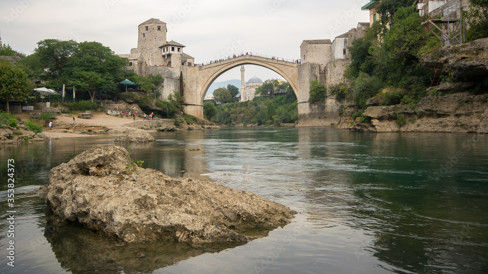 architecture,bridge,mostar,bosnia,Stari Most,historic,ancient,tourism,landscape,old,river,europe,water,travel,city,arch,stone,landmark,medieval,italy,building,herzegovina,sky,holiday,summer,bosnia,tow