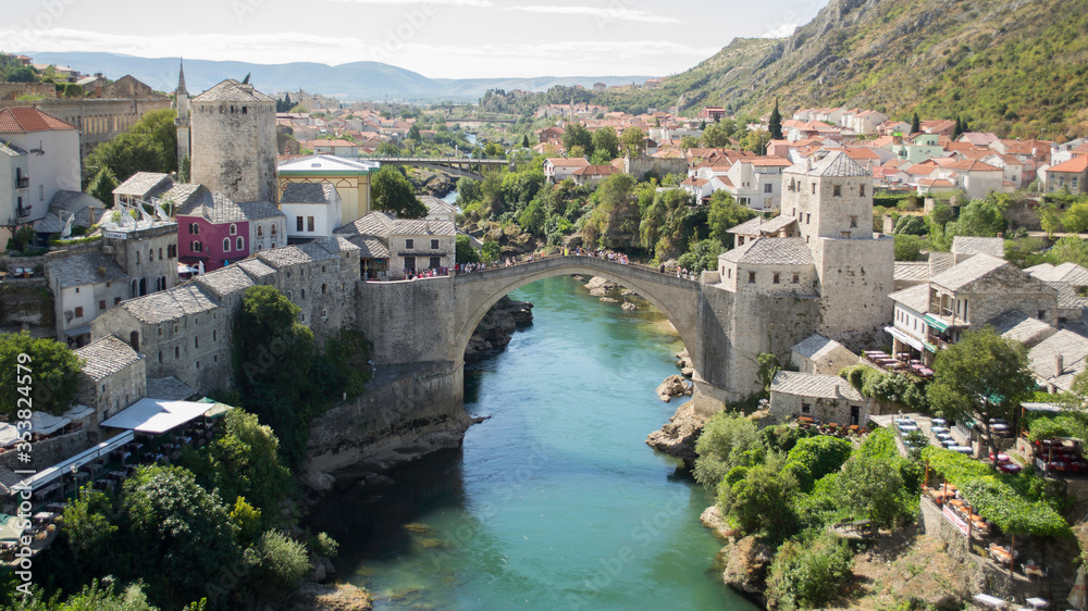 architecture,bridge,mostar,bosnia,Stari Most,historic,ancient,tourism,landscape,old,river,europe,water,travel,city,arch,stone,landmark,medieval,italy,building,herzegovina,sky,holiday,summer,bosnia,tow