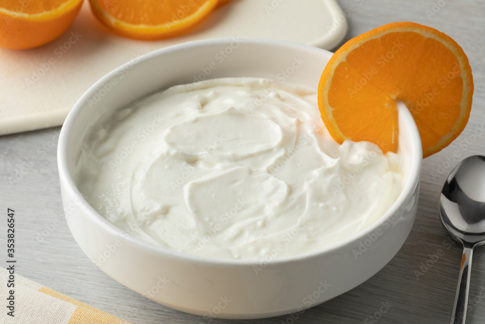 Bowl with homemade strained yoghurt close up Bowl with homemade strained yoghurt close up