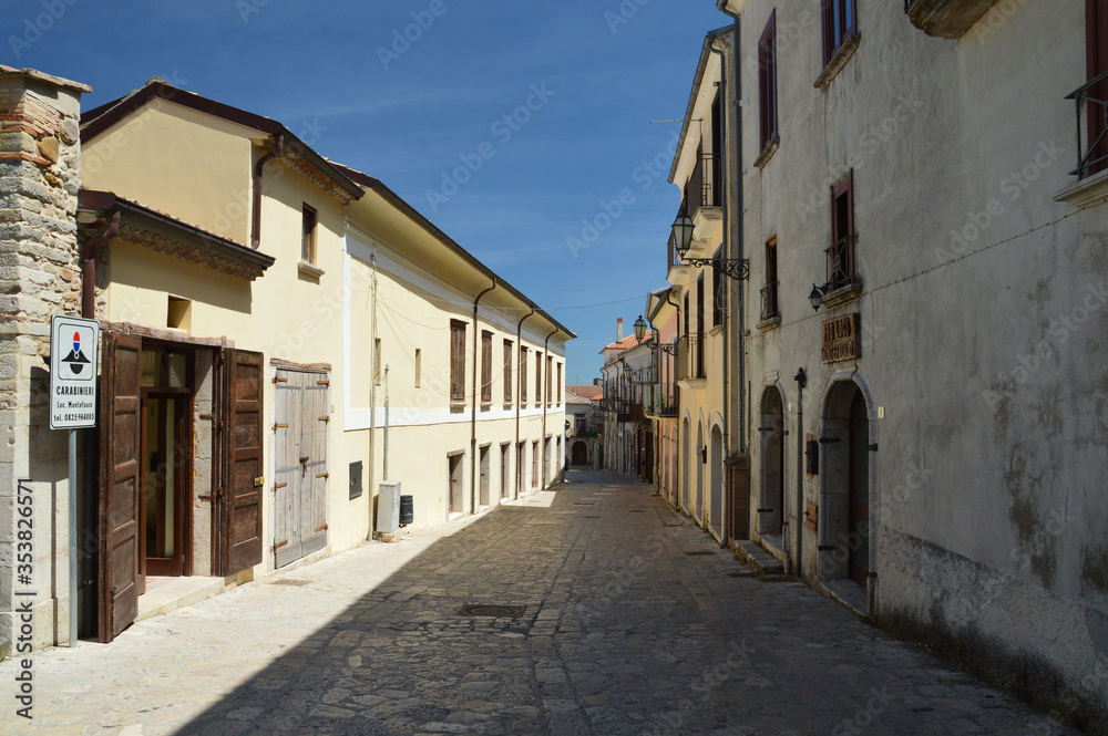 Montefusco, Italy, 05/01/2017. A street between the old houses of a medieval town