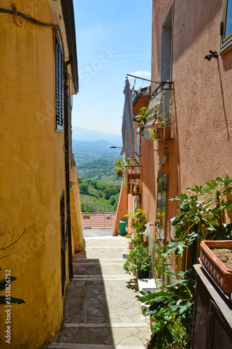 Montefusco, Italy, 05/01/2017. A street between the old houses of a medieval town