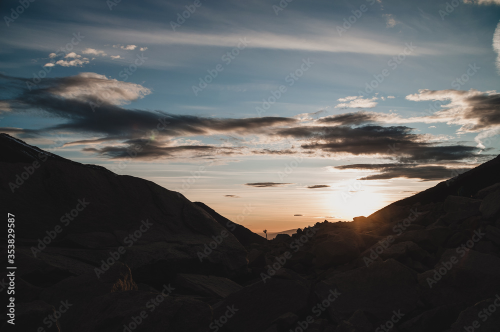 Cloudy sunset in a mountainous region