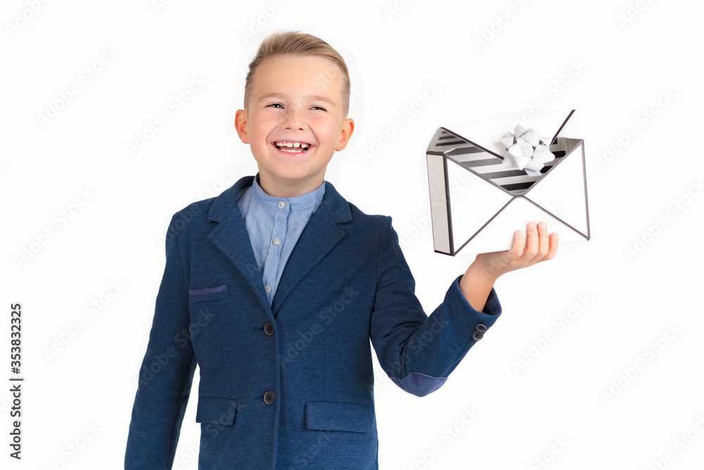 HAPPY LITTLE SMILING BOY LOOKING FORWARD AND LAUGHING BY OPENING THE BOX OF PRESENTS SIMILAR LIKE MAL LETTER.PICTURE ISOLATED ON WHITE BACKGROUND. HAPPY LITTLE SMILING BOY LOOKING FORWARD AND LAUGHING BY OPENING THE BOX OF PRESENTS SIMILAR LIKE MAL LETTER.PICTURE ISOLATED ON WHITE BACKGROUND.