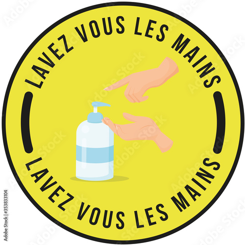 Panneau avec dessin sur les gestes barrières coronavirus "Lavez vous les mains" écrit en noir dans un rond jaune avec pictogramme de mains et pompe a gel hydroalcoolique - antibactérien - désinfectant